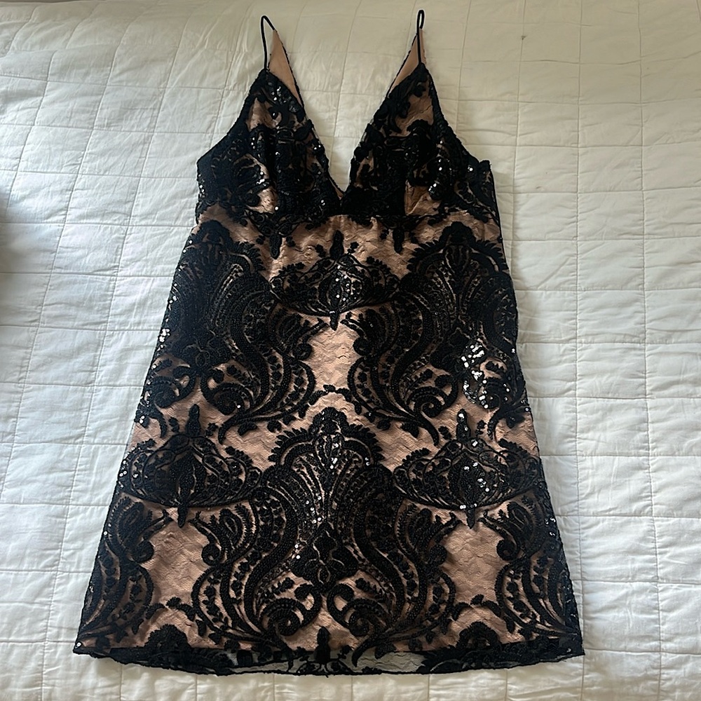 Free people black dress with lined tan slip size zero never worn